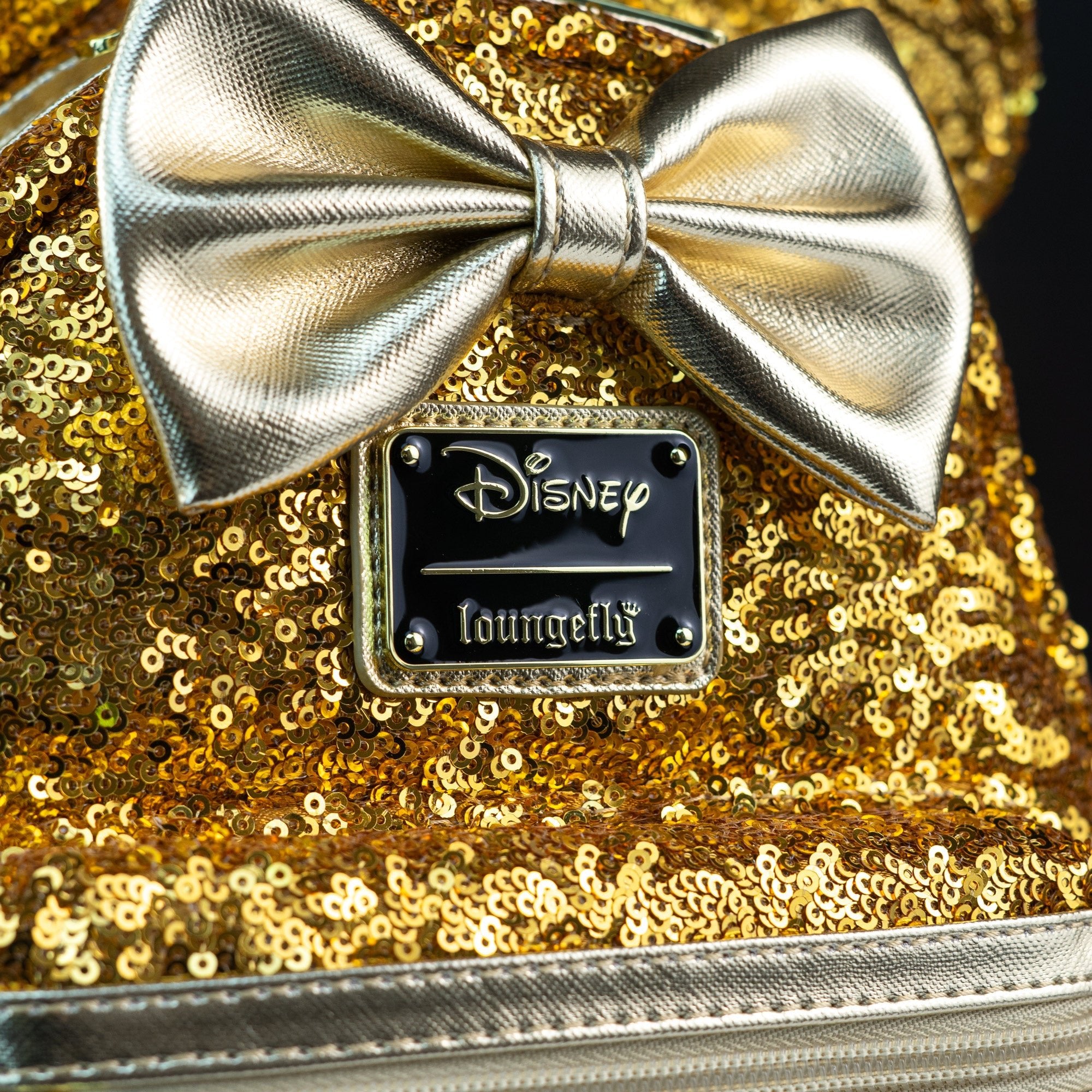 Gold disney backpack best sale