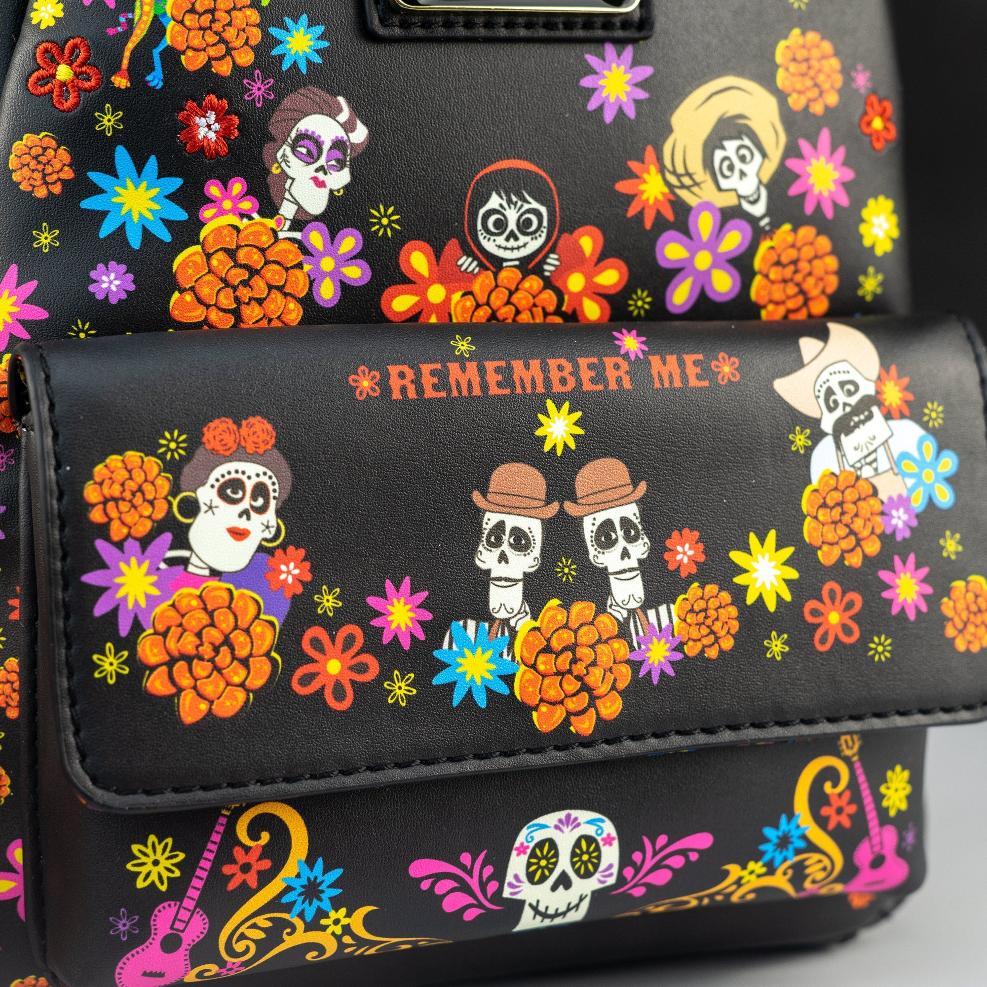 Loungefly x Disney Pixar Coco Remember Me Floral Mini Backpack - GeekCore