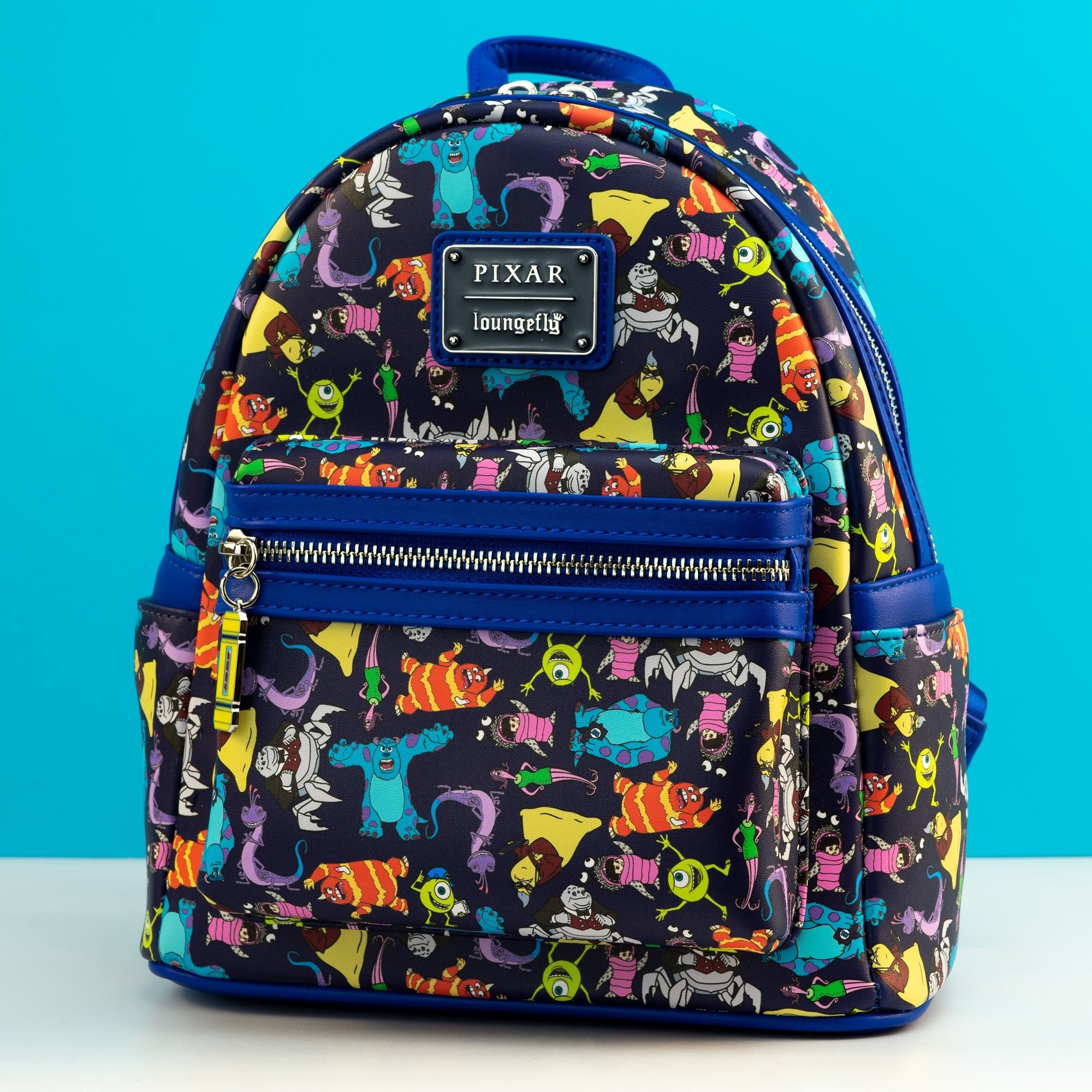 Loungefly x Disney Pixar Monsters Inc AOP Mini Backpack - GeekCore