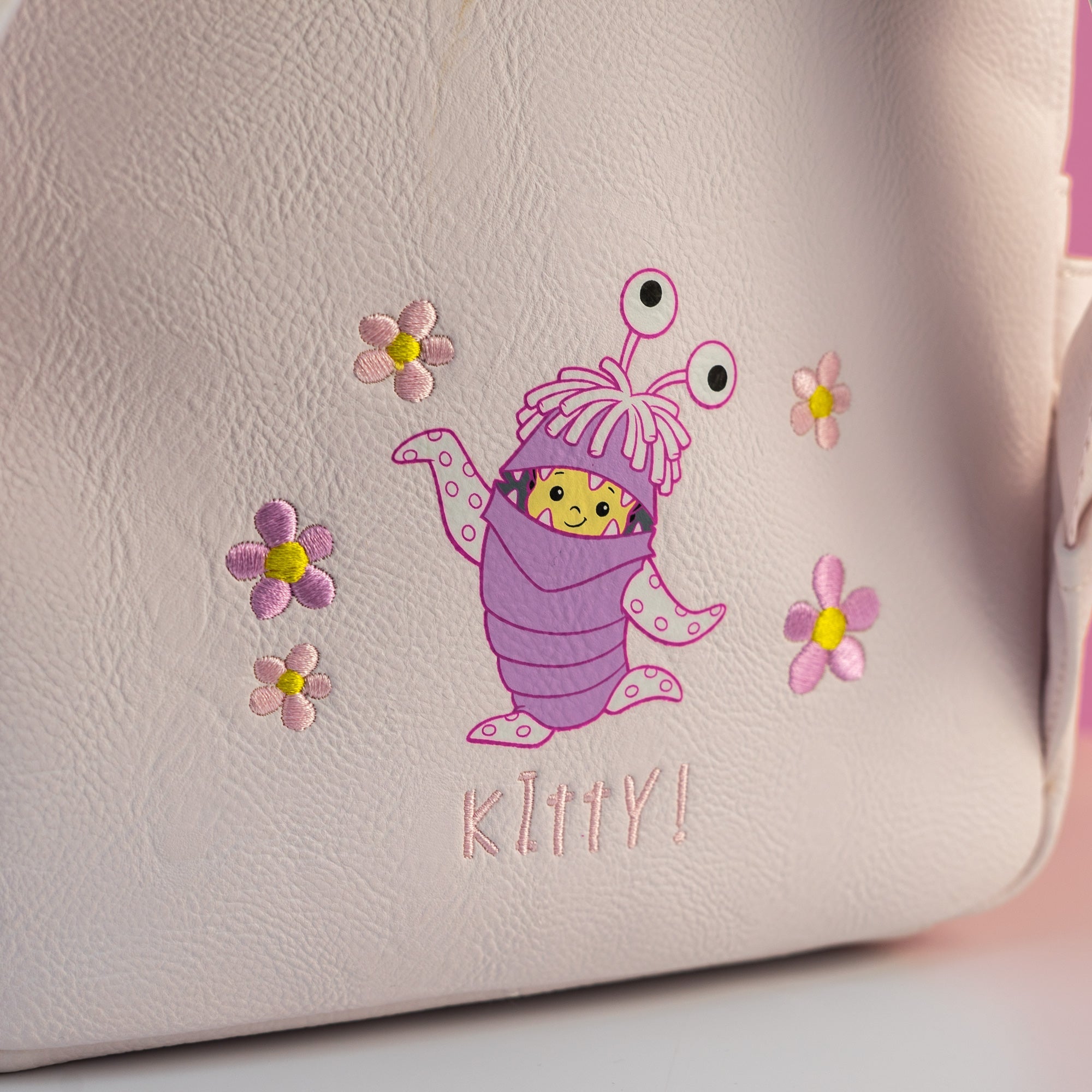 Loungefly x Disney Pixar Monsters Inc Light Up Boo's Door Mini Backpack - GeekCore