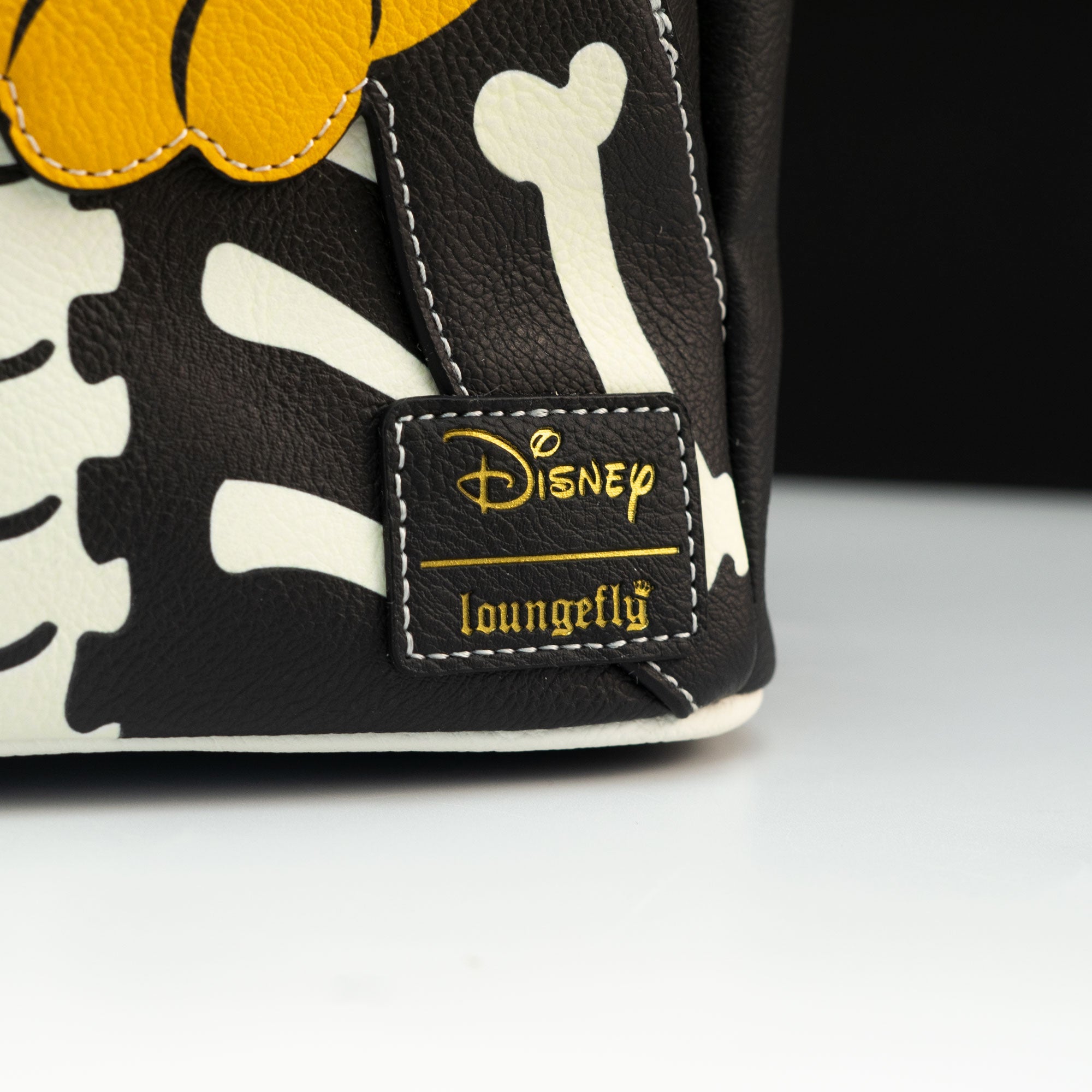 Loungefly x Disney Pluto Skeleton Cosplay Mini Backpack - GeekCore