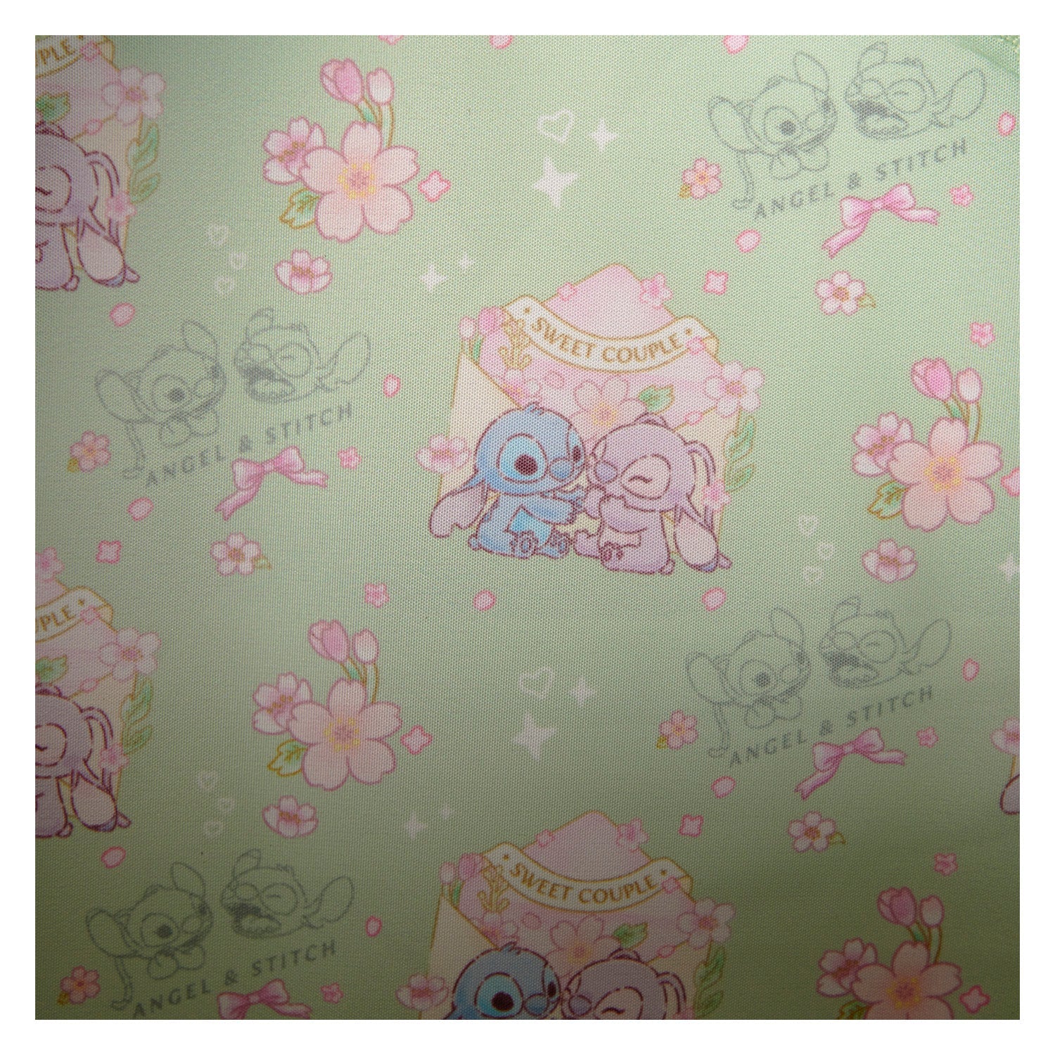 Loungefly x Disney Stitch Cherry Blossom AOP Mini Backpack - GeekCore