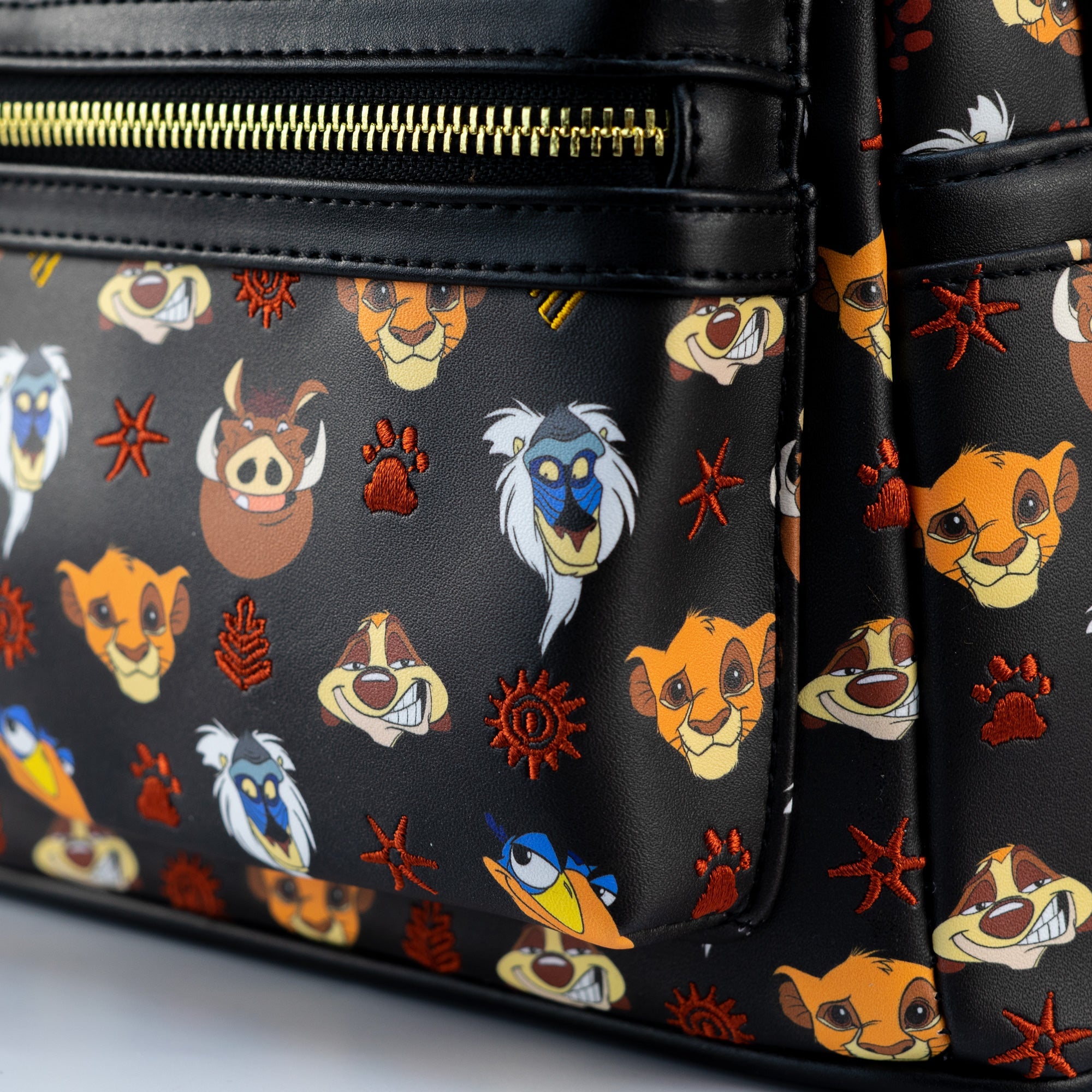 Loungefly x Disney The Lion King Faces AOP Mini Backpack - GeekCore