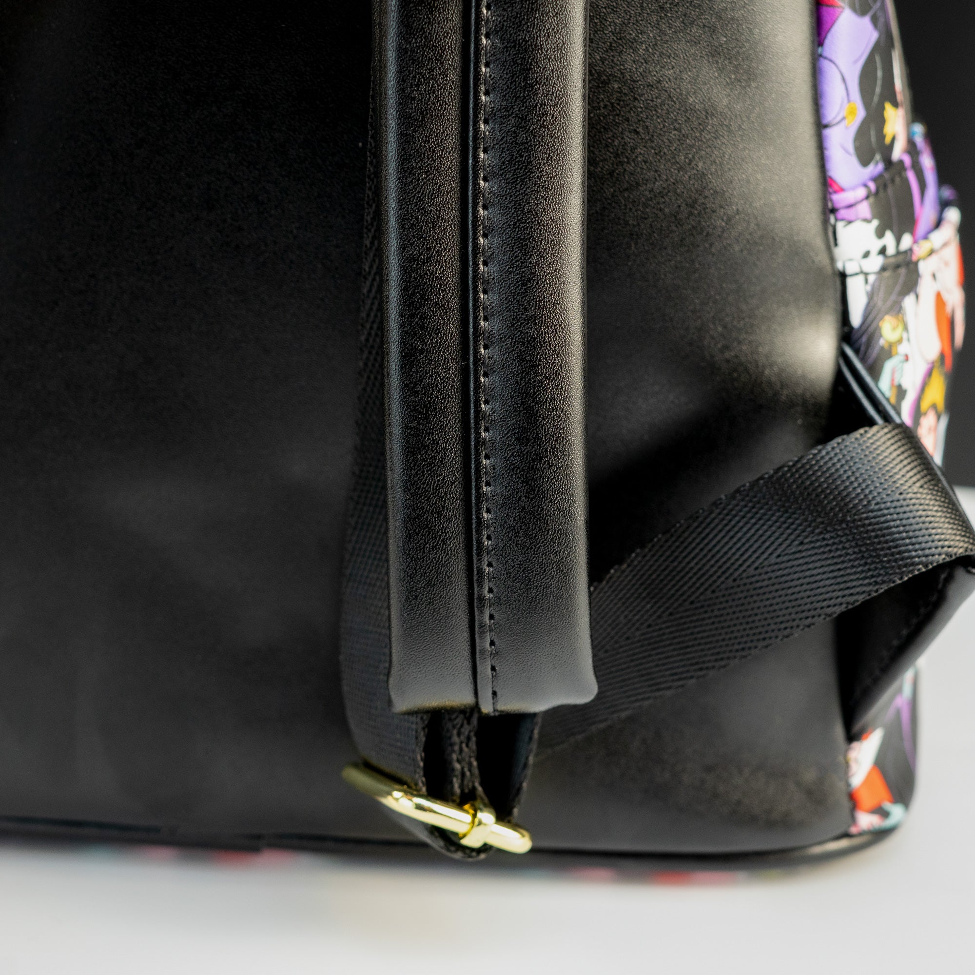 Loungefly x Disney Villains AOP Mini Backpack - GeekCore