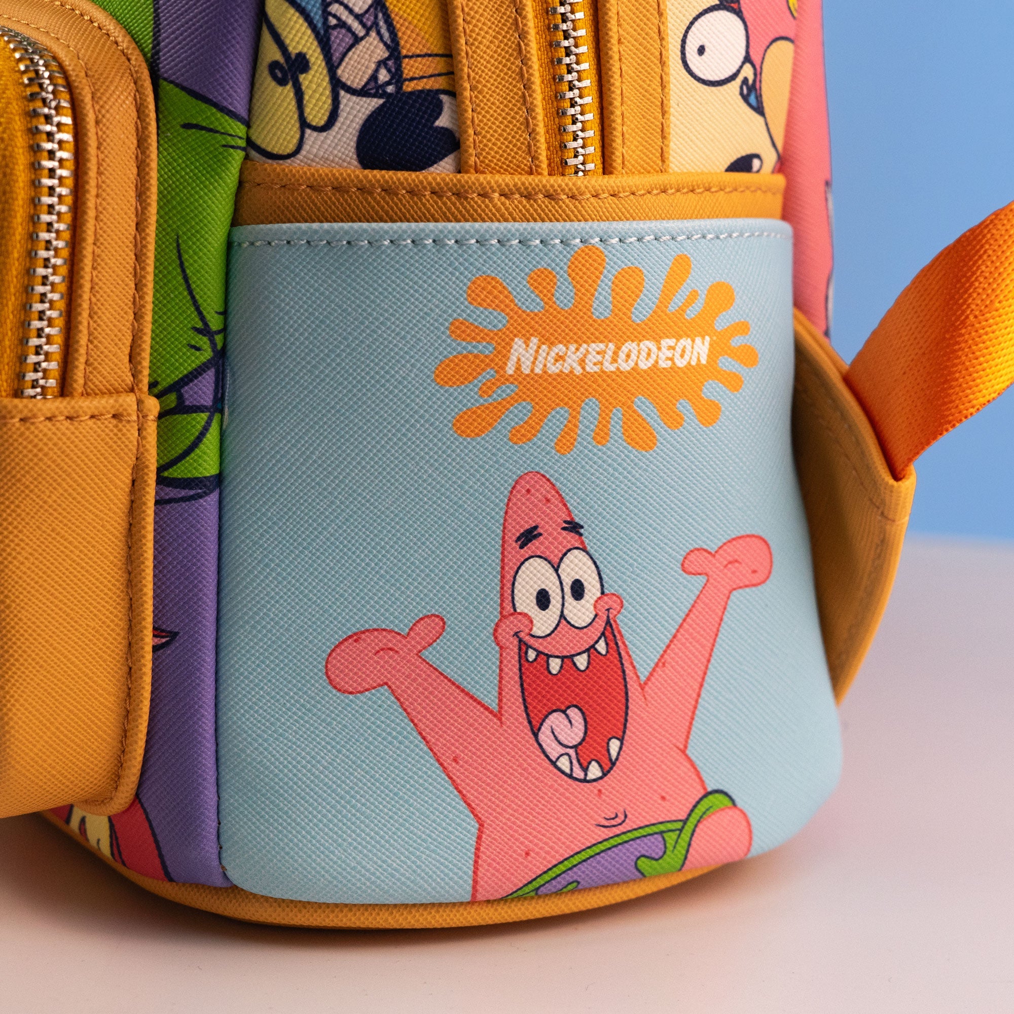 Loungefly x Nickelodeon Nick 90s Colour Block AOP Mini Backpack - GeekCore